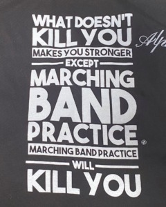 White printed marching band practice shirt with bold typography